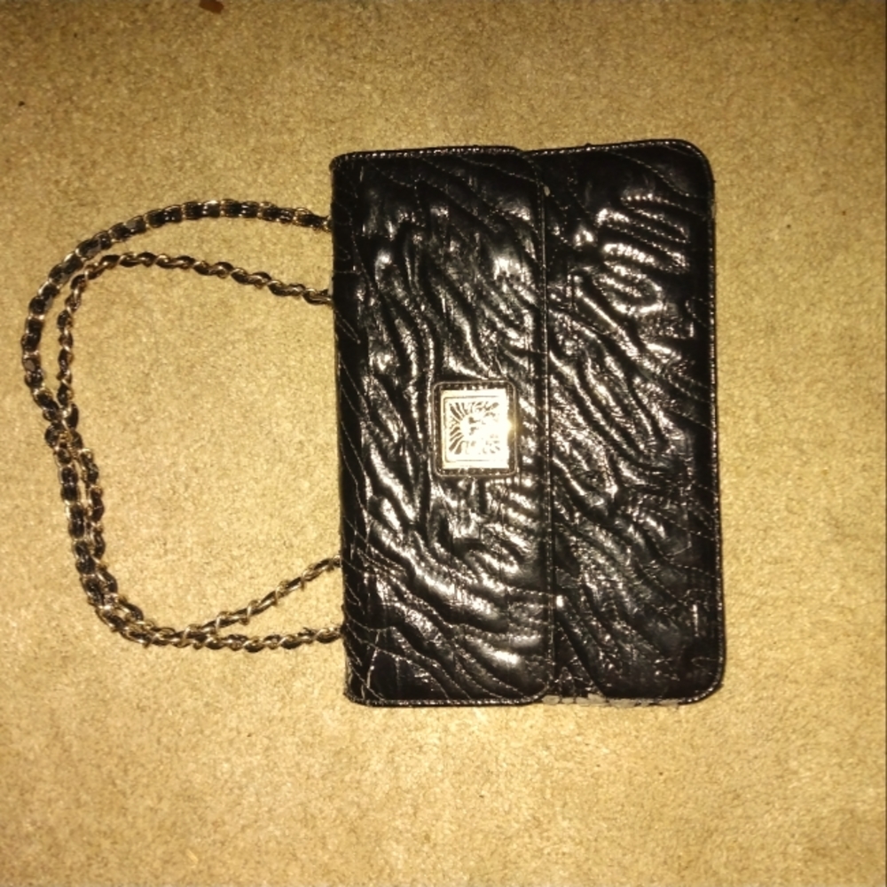 Anne Klein magnetic snap clutch with straps